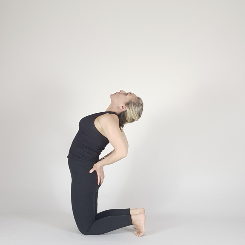 Camel Pose Hands on Hips