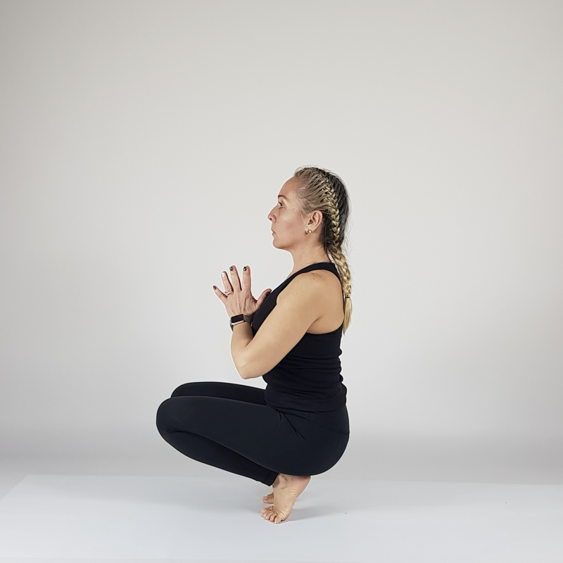 Garland Pose with Prayer Hands
