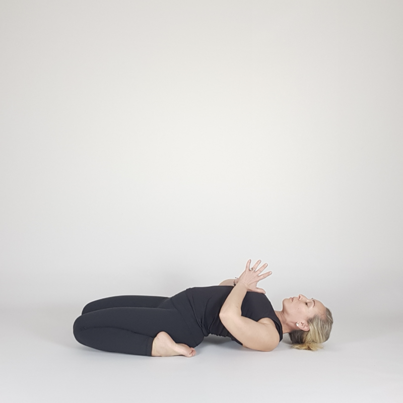 Reclined Hero with Hands at Heart