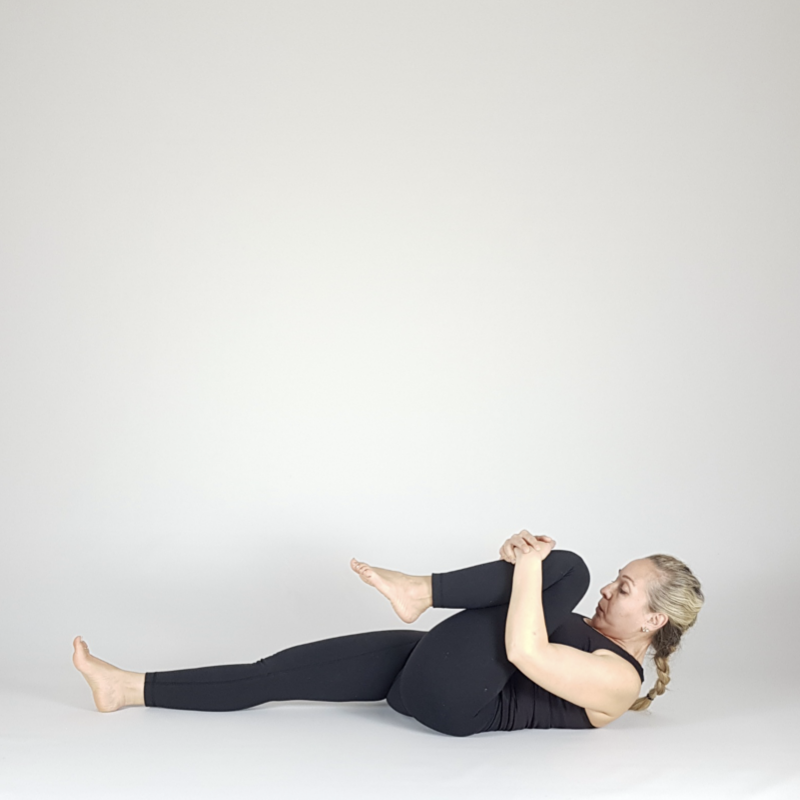 Boat Pose Hands Behind Head